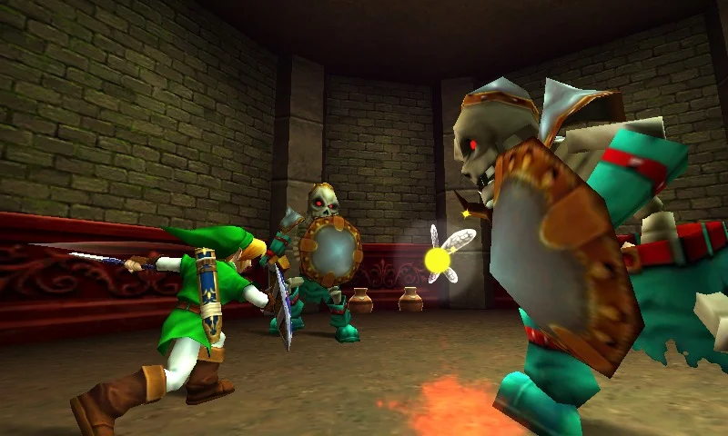 Link niño combate contra un Iron Knuckle en el Templo del Espíritu de Ocarina of Time 3D.
